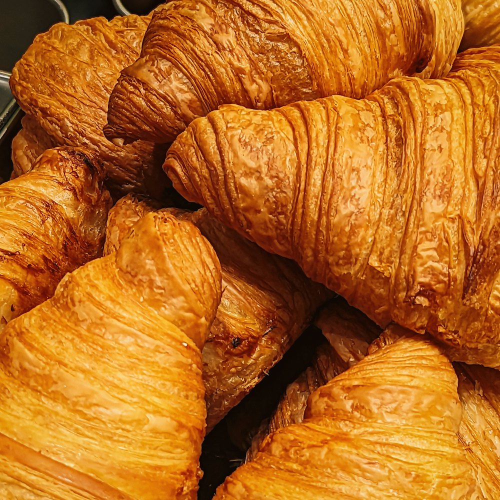 A pile of golden butter croissants